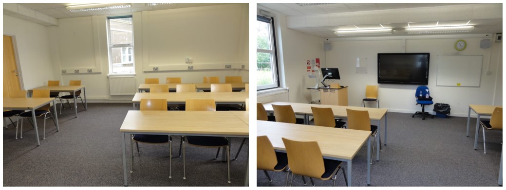 Classroom with rows of tables and chairs.